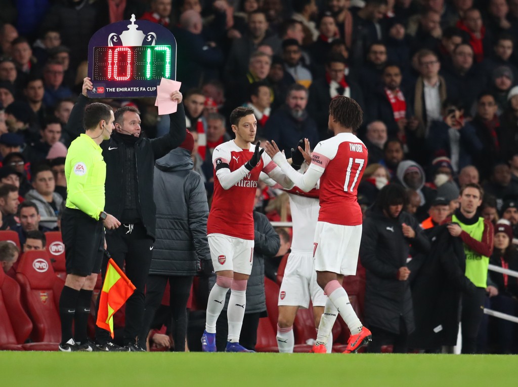Ozil has largely been restricted to appearances off the bench this term. (Photo by Catherine Ivill/Getty Images)