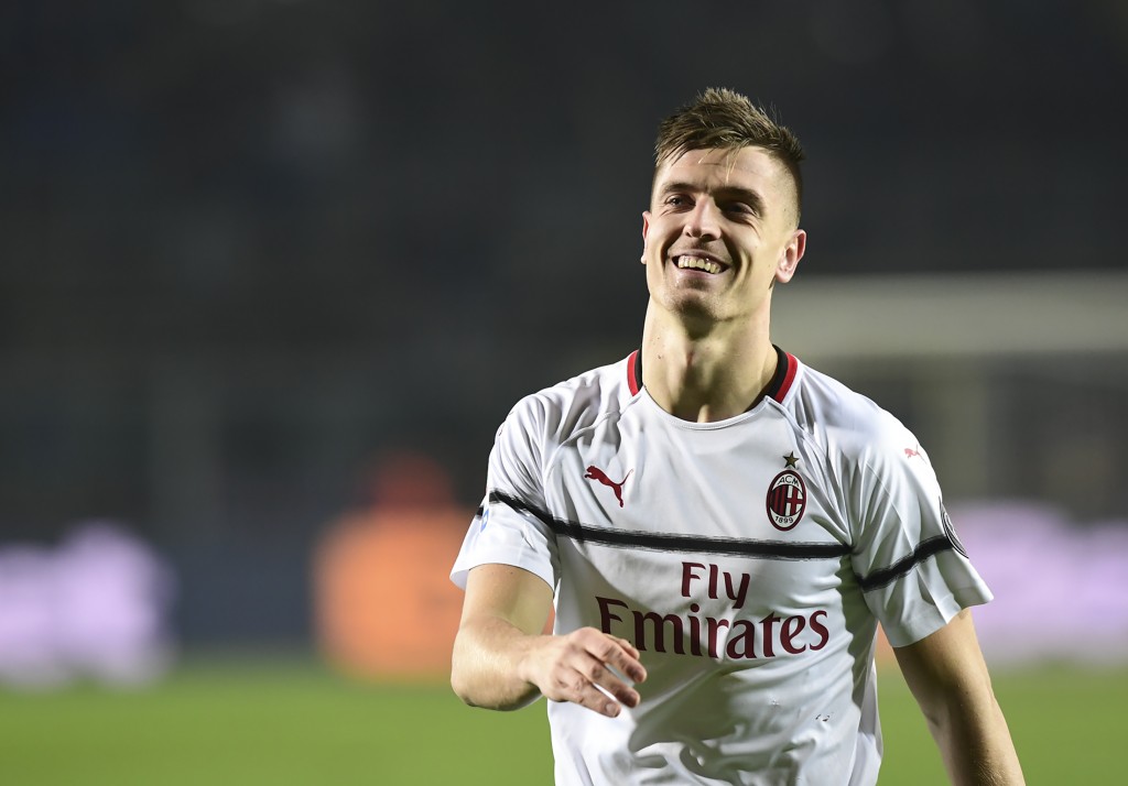 It has been all smiles for AC Milan and Piatek since the the Pole's move from Genoa last month. (Photo by Miguel Medina/AFP/Getty Images)