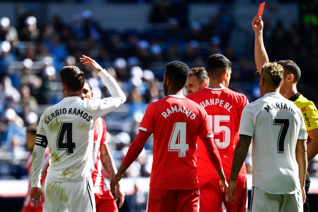 Ramos received the 25th red card of his career (Photo by GABRIEL BOUYS/AFP/Getty Images)