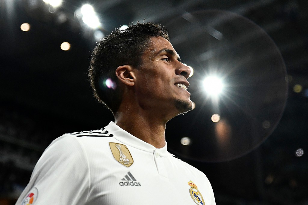 Real Madrid's French defender Raphael Varane smiles during the Spanish league football match between Real Madrid and Valencia at the Santiago Bernabeu stadium in Madrid on December 1, 2018. (Photo by OSCAR DEL POZO / AFP) (Photo credit should read OSCAR DEL POZO/AFP/Getty Images)