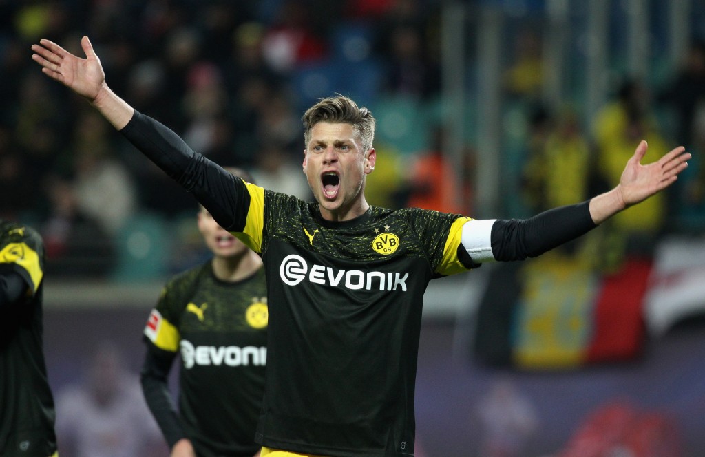 LEIPZIG, SAXONY - JANUARY 19: Lukasz Piszczek of Dortmund reacts during the Bundesliga match between RB Leipzig and Borussia Dortmund at Red Bull Arena on January 19, 2019 in Leipzig, Germany. (Photo by Karina Hessland/Bongarts/Getty Images)
