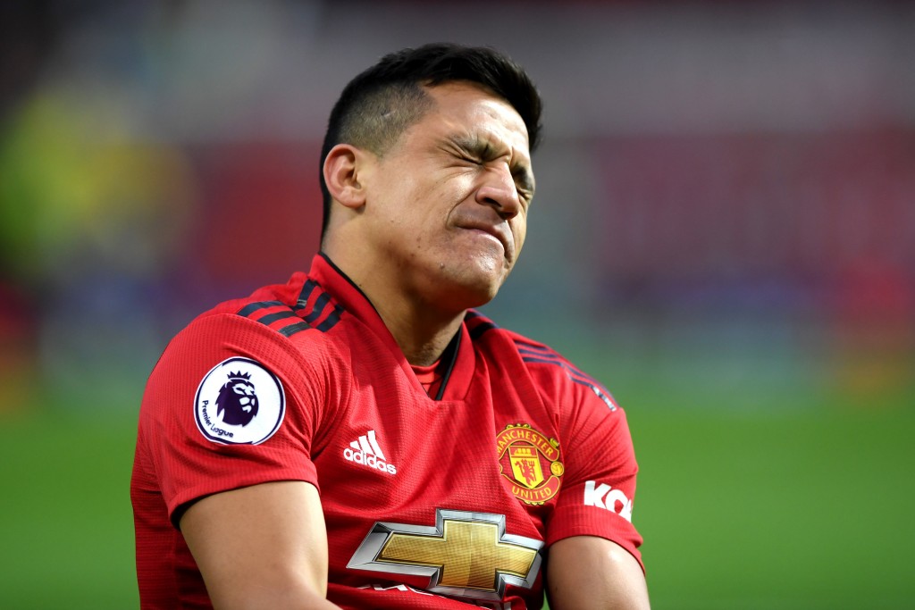 MANCHESTER, ENGLAND - MARCH 02: Alexis Sanchez of Manchester United reacts with an injury during the Premier League match between Manchester United and Southampton FC at Old Trafford on March 02, 2019 in Manchester, United Kingdom. (Photo by Shaun Botterill/Getty Images)