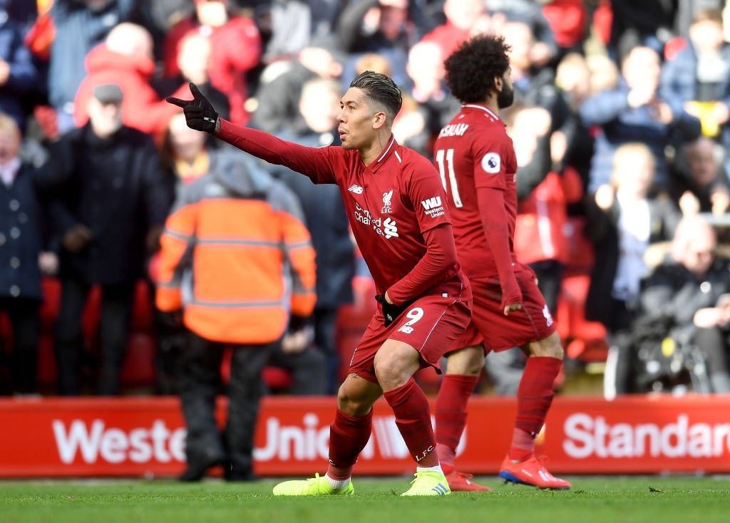 Salah created both of Firmino's goals. (Photo by Michael Regan/Getty Images)