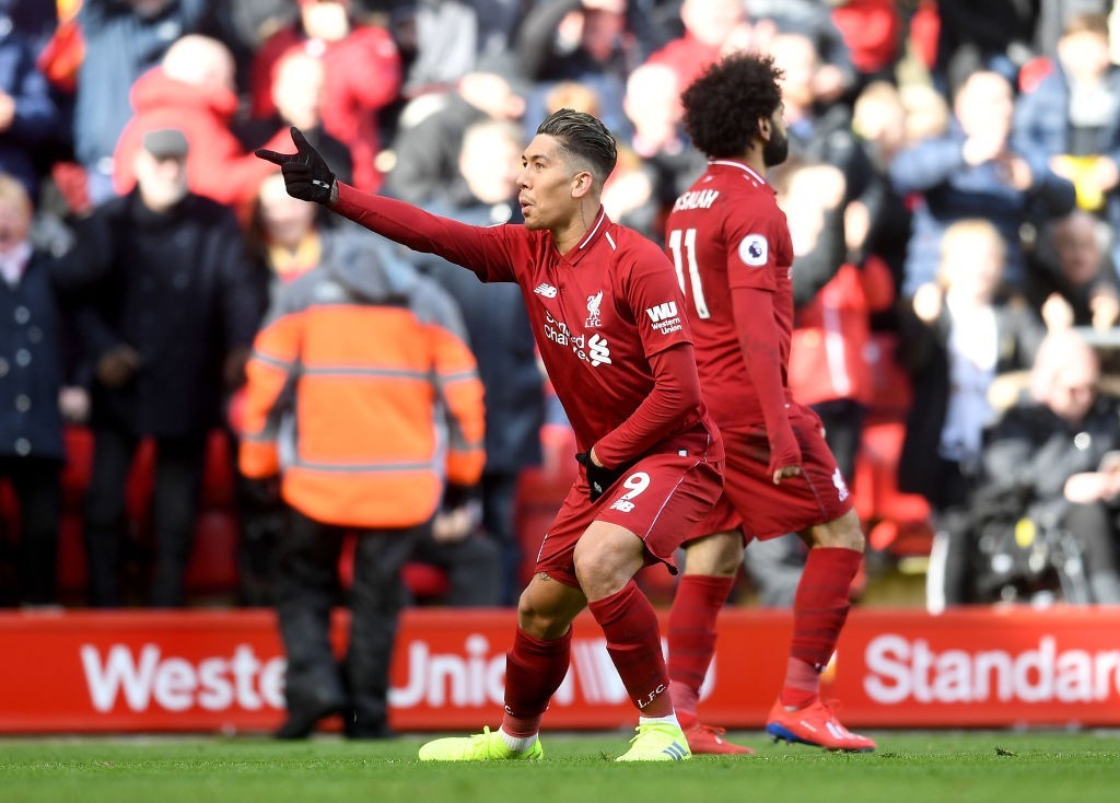 Salah created both of Firmino's goals. (Photo by Michael Regan/Getty Images)