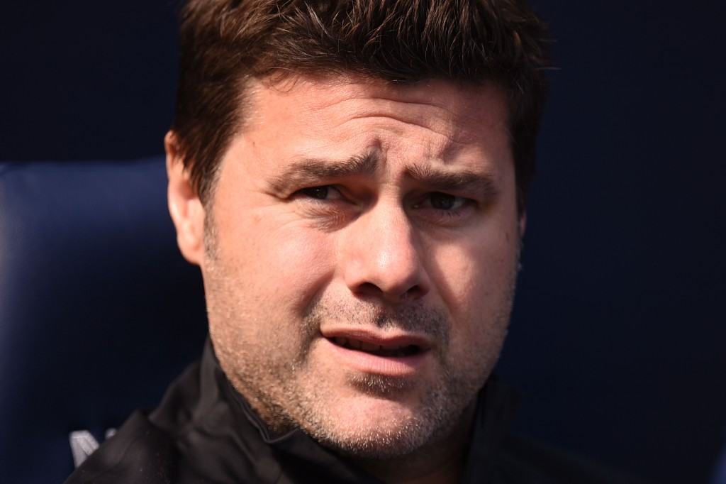 Mauricio Pochettino needs a response from his side. (Photo by Oli Scarff/AFP/Getty Images)