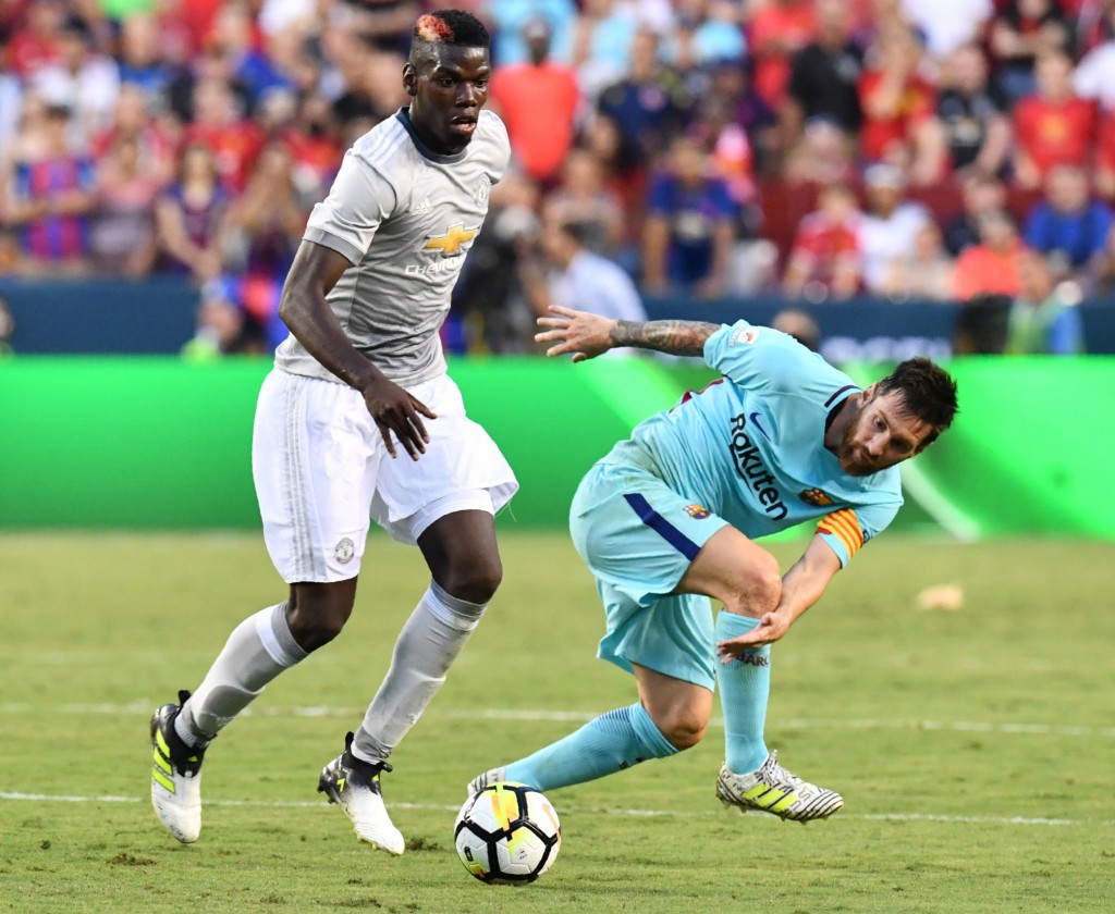 Pogba could well have been playing alongside Messi. (Photo by Nicholas Kamm/AFP/Getty Images)