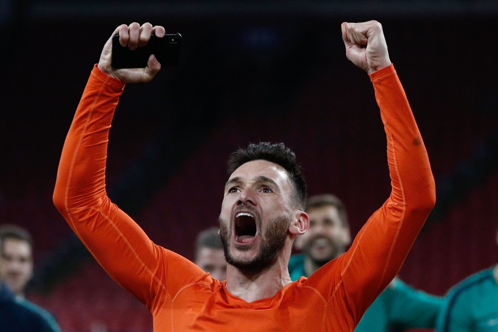 Lloris had his part to play in the win as well. (Photo by Adrian Dennis/AFP/Getty Images)