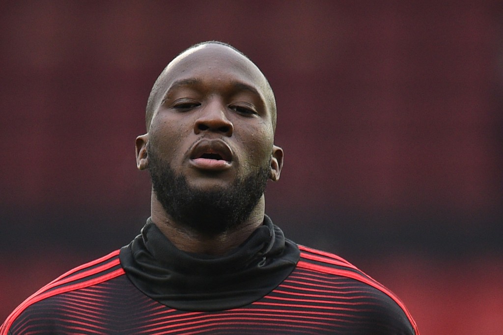 Manchester United's Belgian striker Romelu Lukaku warms up ahead of the English FA Cup third round football match between Manchester United and Reading at Old Trafford in Manchester, north west England, on January 5, 2019. (Photo by Oli SCARFF / AFP) / RESTRICTED TO EDITORIAL USE. No use with unauthorized audio, video, data, fixture lists, club/league logos or 'live' services. Online in-match use limited to 120 images. An additional 40 images may be used in extra time. No video emulation. Social media in-match use limited to 120 images. An additional 40 images may be used in extra time. No use in betting publications, games or single club/league/player publications. / (Photo credit should read OLI SCARFF/AFP/Getty Images)