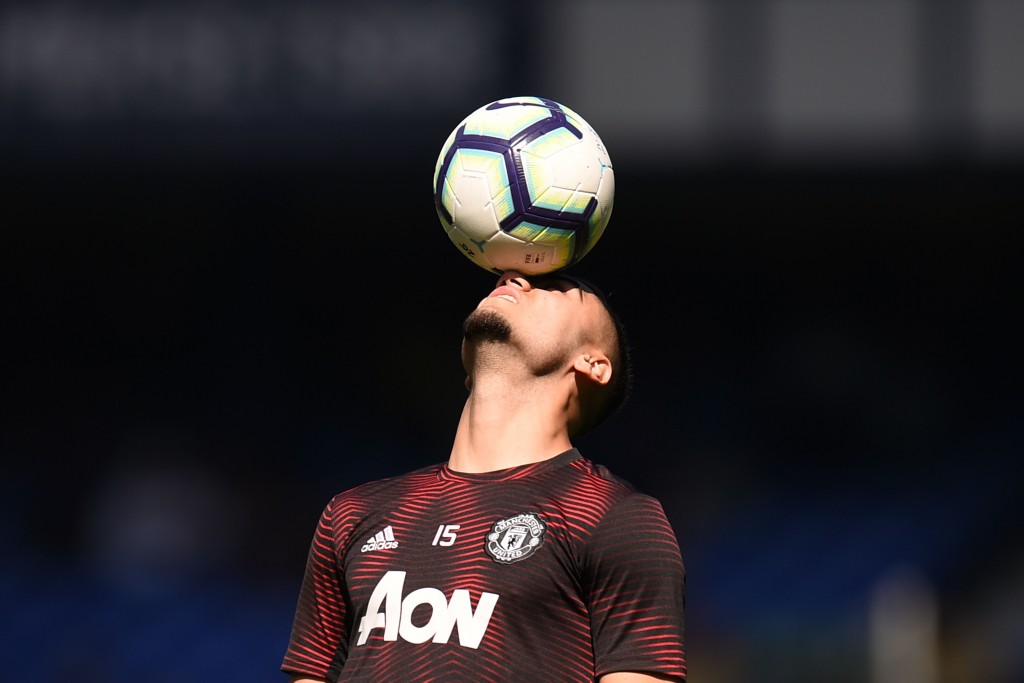 TOPSHOT - Manchester United's Belgian-born Brazilian midfielder Andreas Pereira warms up before the English Premier League football match between Everton and Manchester United at Goodison Park in Liverpool, north west England on April 21, 2019. (Photo by Oli SCARFF / AFP) / RESTRICTED TO EDITORIAL USE. No use with unauthorized audio, video, data, fixture lists, club/league logos or 'live' services. Online in-match use limited to 120 images. An additional 40 images may be used in extra time. No video emulation. Social media in-match use limited to 120 images. An additional 40 images may be used in extra time. No use in betting publications, games or single club/league/player publications. / (Photo credit should read OLI SCARFF/AFP/Getty Images)