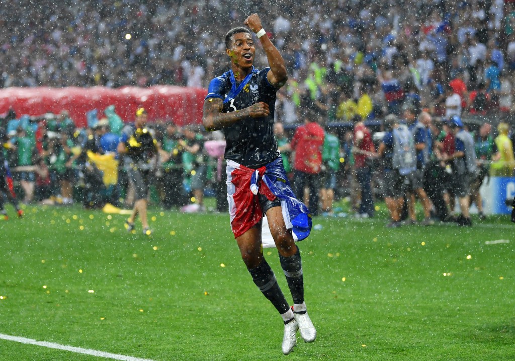 MOSCOW, RUSSIA - JULY 15: Presnel Kimpembe of France celebrates victory during the 2018 FIFA World Cup Final between France and Croatia at Luzhniki Stadium on July 15, 2018 in Moscow, Russia. (Photo by Dan Mullan/Getty Images)