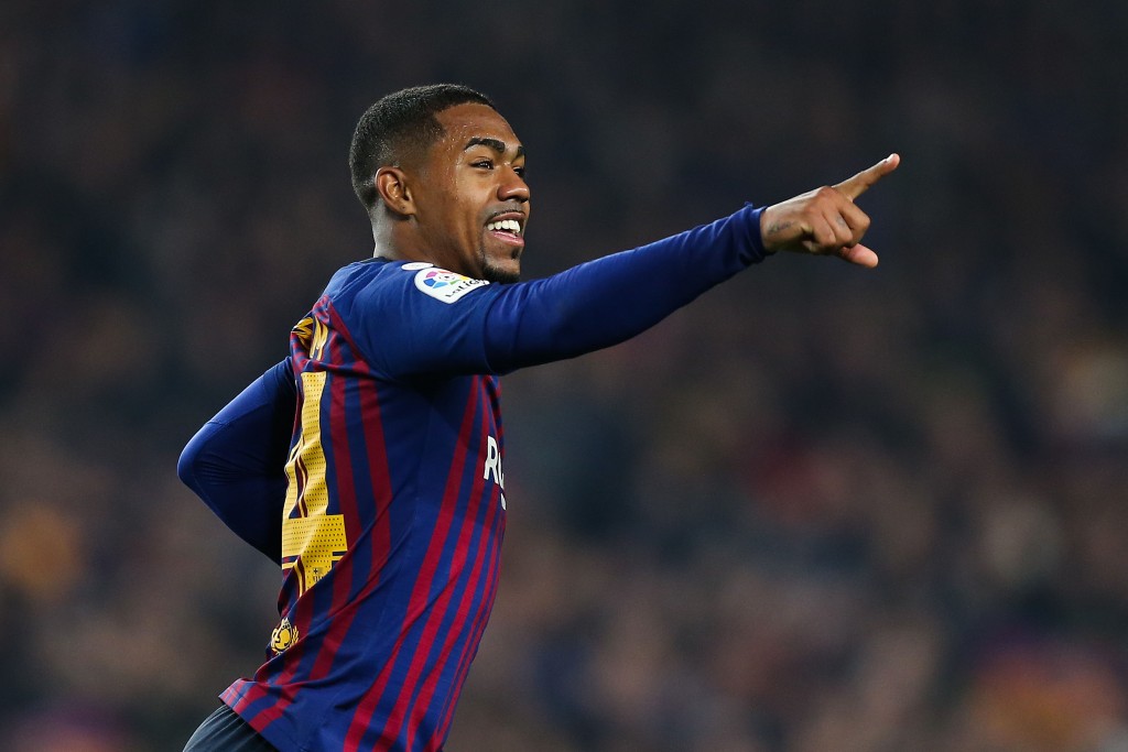 BARCELONA, SPAIN - FEBRUARY 06: Malcom of FC Barcelona celebrates after scoring his team's first goal during the Copa del Semi Final first leg match between Barcelona and Real Madrid at Nou Camp on February 06, 2019 in Barcelona, Spain. (Photo by Angel Martinez/Getty Images)