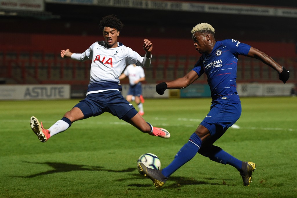 STEVENAGE, ENGLAND - MARCH 01: Daishawn Redan of Chelsea is challenged by Brooklyn Lyons-Foster of Tottenham Hotspur during the Premier League 2 match between Tottenham Hotspur and Chelsea at The Lamex Stadium on March 01, 2019 in Stevenage, England. (Photo by Harriet Lander/Getty Images)