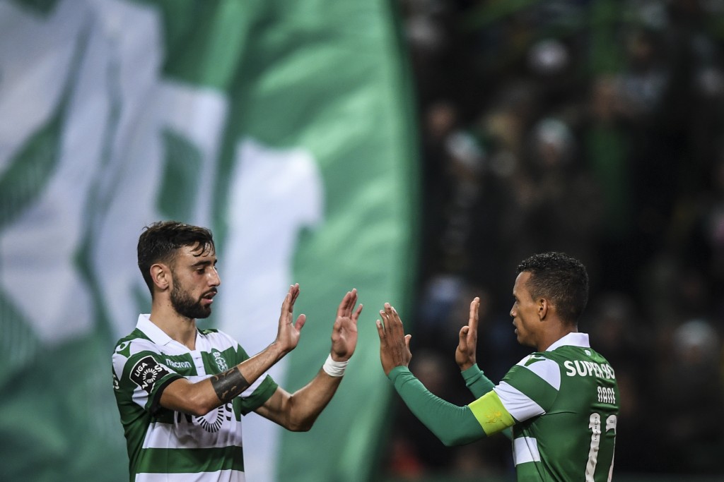 A new twist emerges in the chase for Bruno Fernandes (L). (Photo by Patricia de Melo Moreira/AFP/Getty Images)