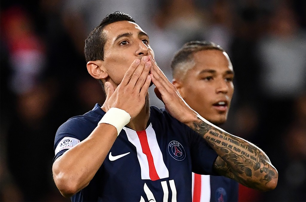 Paris Saint-Germain's Argentine midfielder Angel Di Maria (C) celebrates after scoring a goal during the French L1 football match between Paris Saint-Germain (PSG) and Nimes Olympique on August 11, 2019 at the Parc des Princes stadium in Paris. (Photo by FRANCK FIFE / AFP) (Photo credit should read FRANCK FIFE/AFP/Getty Images)
