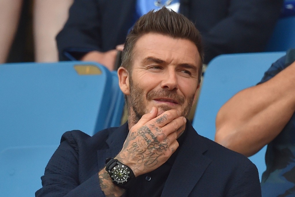 England's football legend David Beckham gestures ahead ofthe France 2019 Women's World Cup quarter-final football match between Norway and England, on June 27, 2019, at the Oceane stadium in Le Havre, north western France. (Photo by LOIC VENANCE / AFP) (Photo credit should read LOIC VENANCE/AFP/Getty Images)