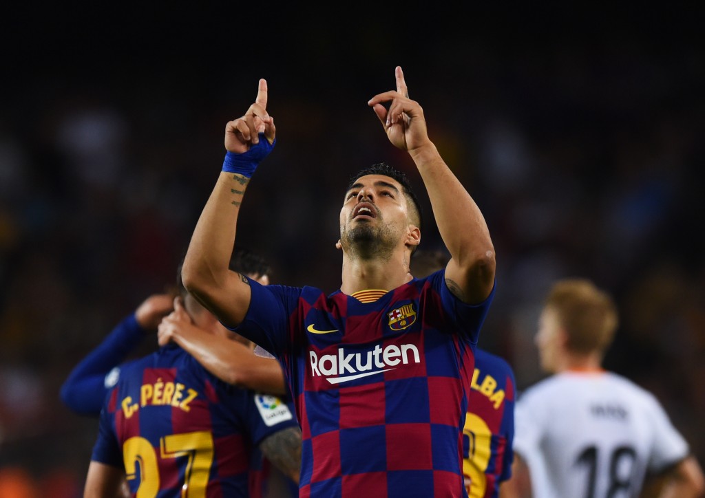Suarez on the double (Photo by Alex Caparros/Getty Images)