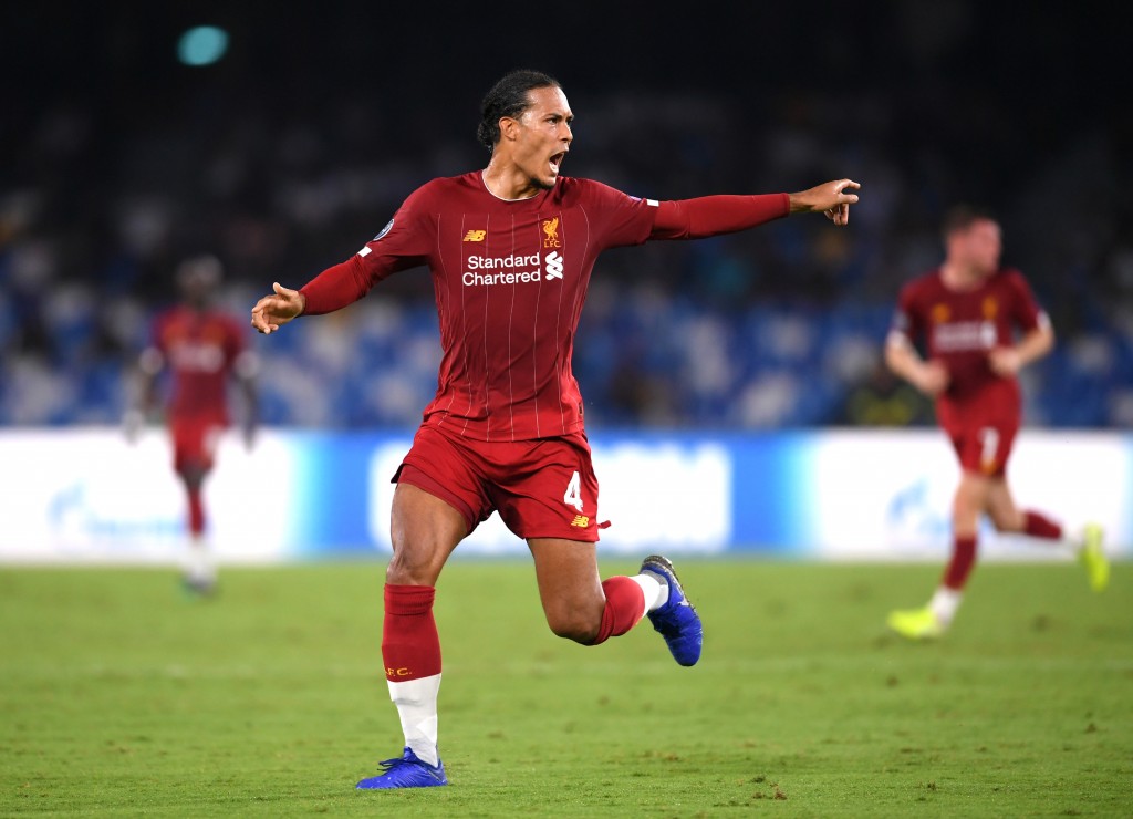 A rare mistake from van Dijk ended Liverpool's night. (Photo by Laurence Griffiths/Getty Images)