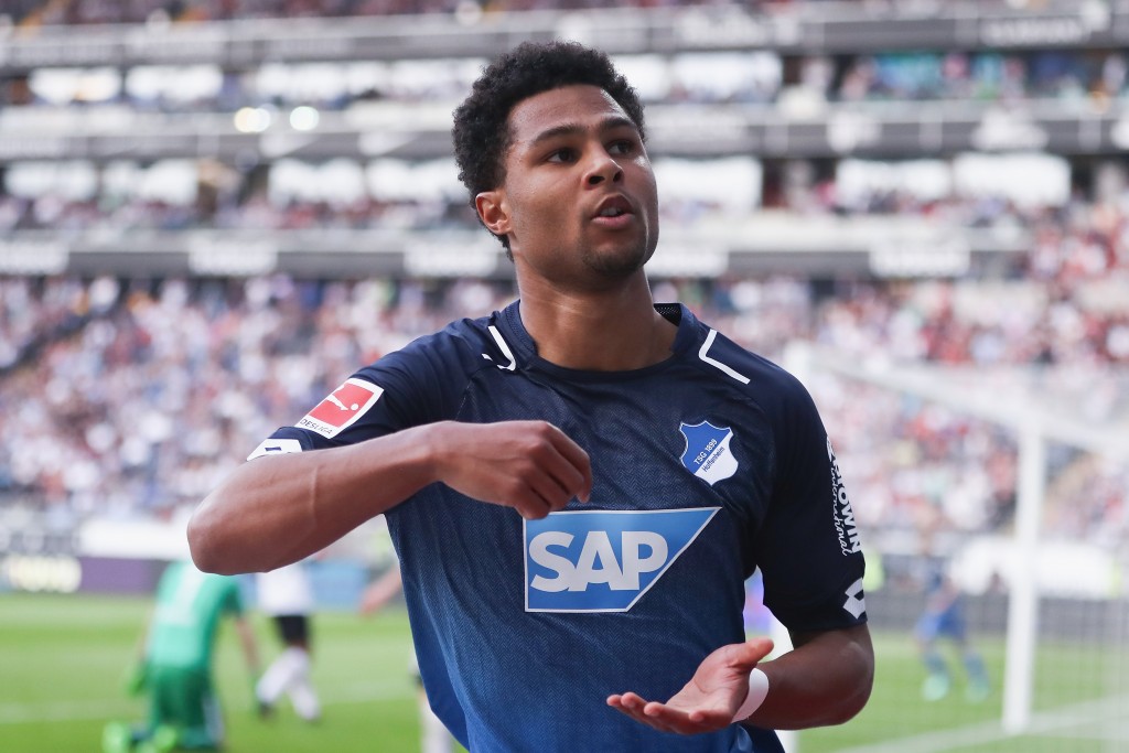 FRANKFURT AM MAIN, GERMANY - APRIL 08: Serge Gnabry of Hoffenheim celebrates his team's first goal during the Bundesliga match between Eintracht Frankfurt and TSG 1899 Hoffenheim at Commerzbank-Arena on April 8, 2018 in Frankfurt am Main, Germany. (Photo by Alex Grimm/Bongarts/Getty Images)