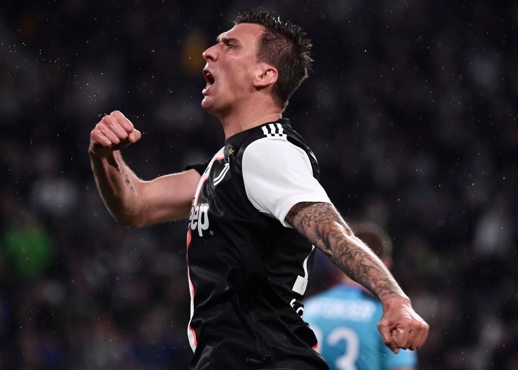 Could Mandzukic be celebrating a move to Manchester United in January? (Photo by Marco Bertorello/AFP/Getty Images)