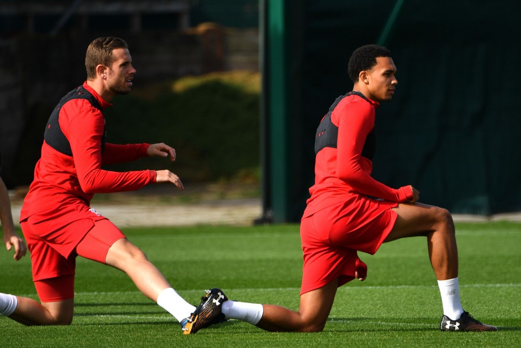 Jordan Henderson and Trent Alexander-Arnold will miss out for Liverpool against Arsenal. (Photo by Paul Ellis/AFP/Getty Images)