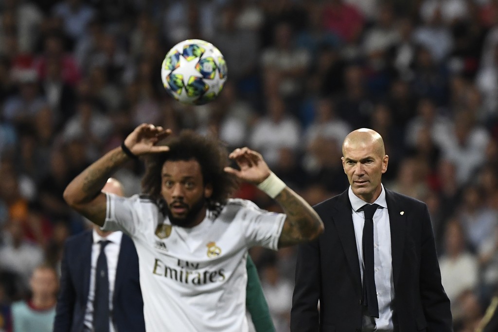 Zidane will be without the services of Marcelo (Photo by PIERRE-PHILIPPE MARCOU/AFP via Getty Images)