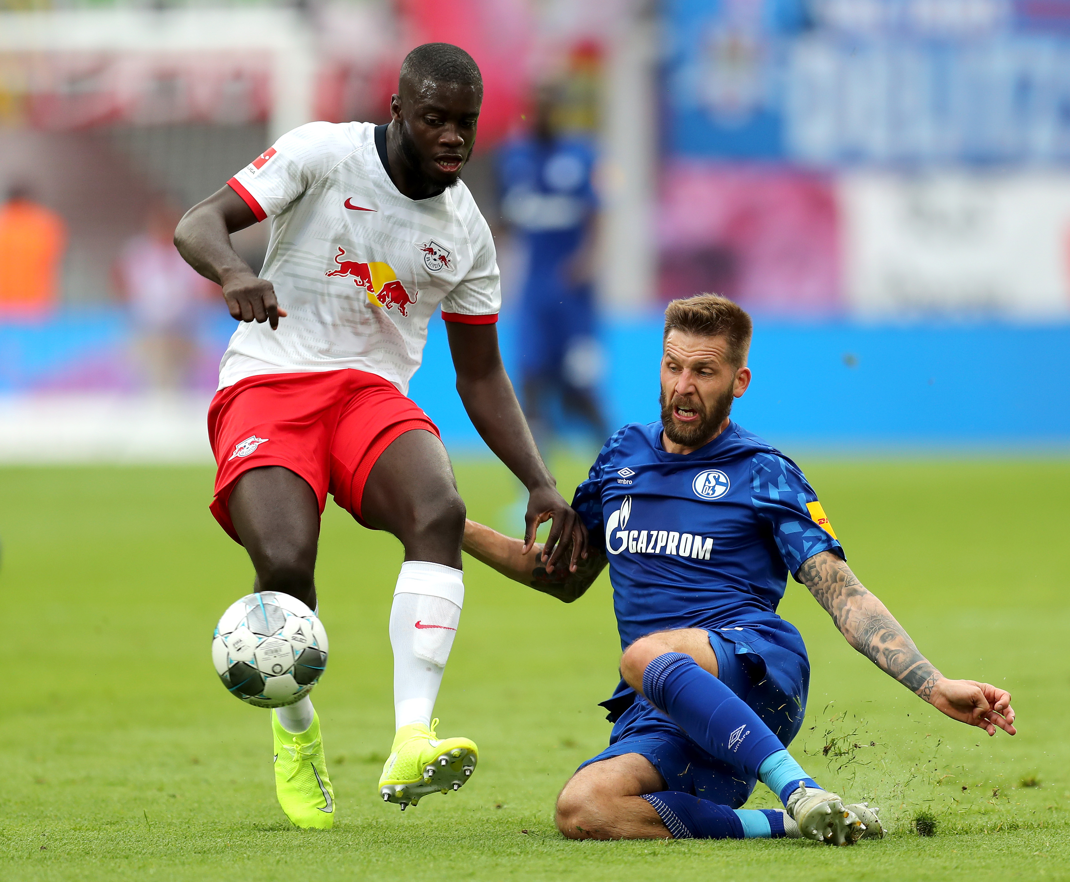 Upamecano (L) remains on Arsenal's radar. (Photo by Boris Streubel/Bongarts/Getty Images)