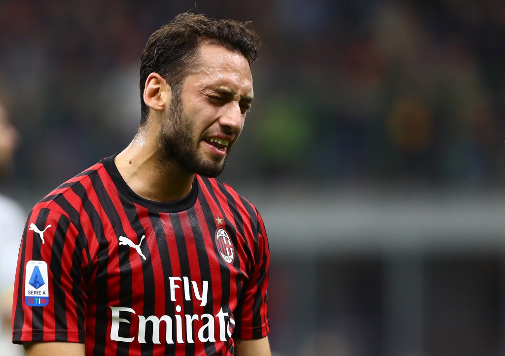 AC Milan star Hakan Calhanoglu is suspended for the tie (Photo by Marco Luzzani/Getty Images)