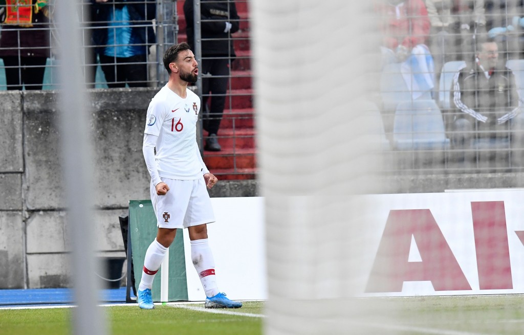 Set to celebrate a move to Manchester United? (Photo by John Thys/AFP via Getty Images)