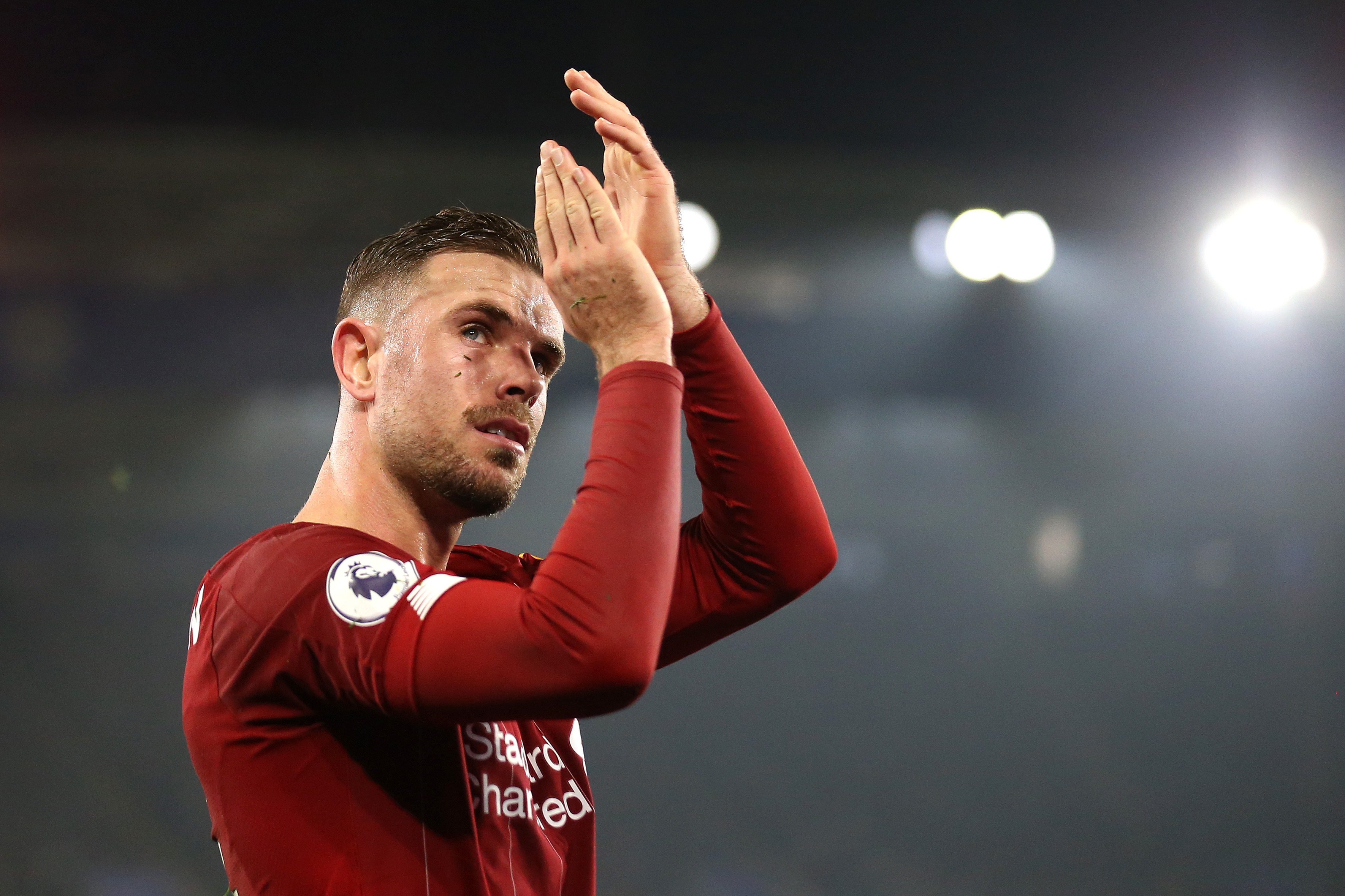 Liverpool's Captain Fantastic Henderson in a contract standoff. (Photo by Alex Pantling/Getty Images)