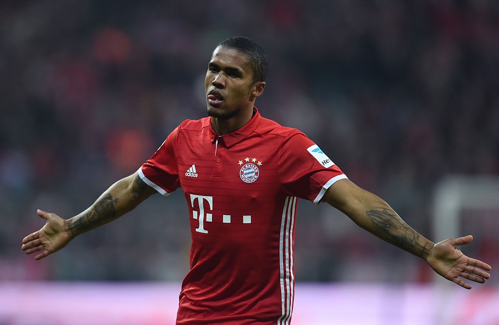 Douglas Costa had a sour end to his Bayern stint. (Photo credit should read CHRISTOF STACHE/AFP via Getty Images)