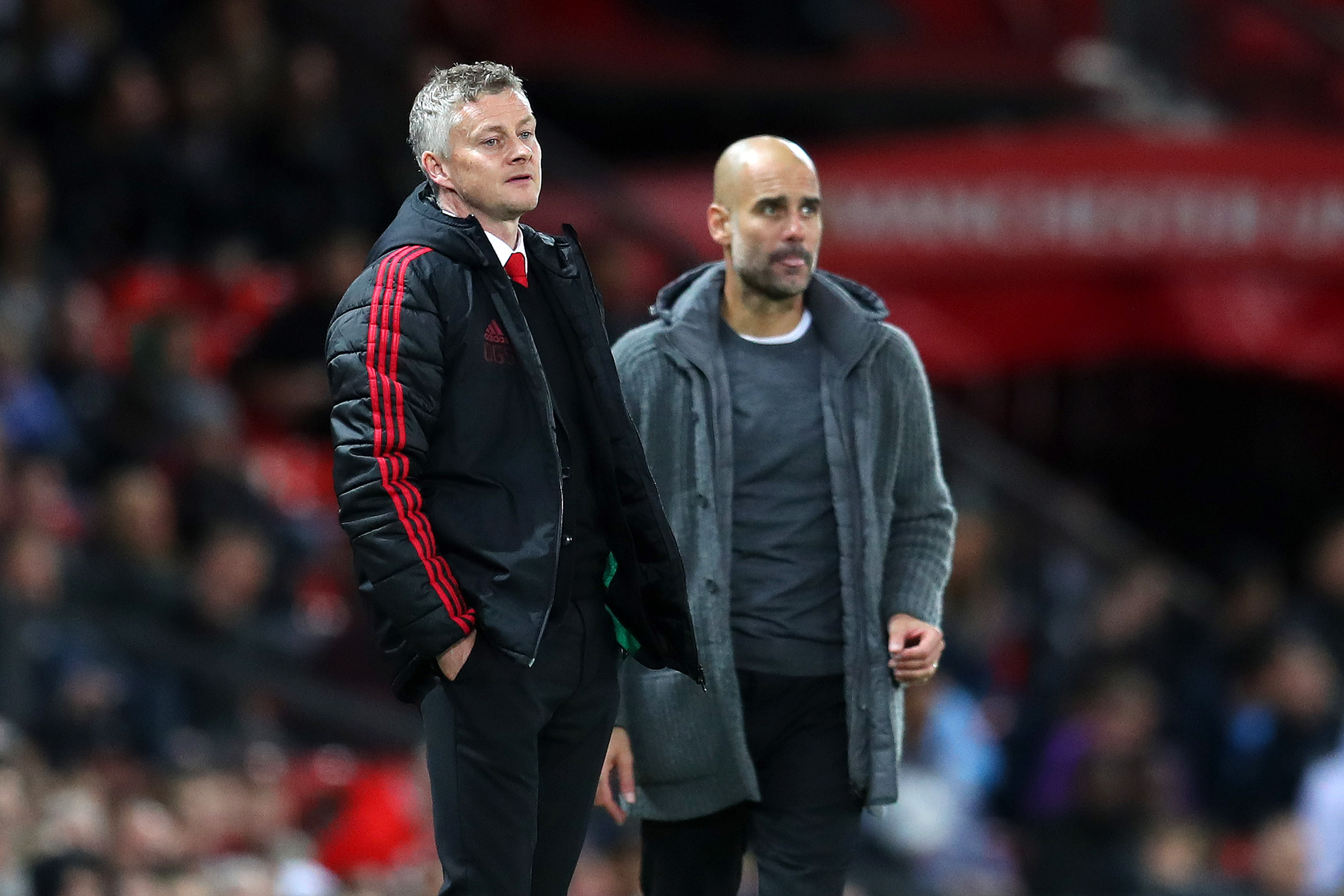 Solskjaer and Guardiola competing for Kane's signing (Photo by Catherine Ivill/Getty Images)