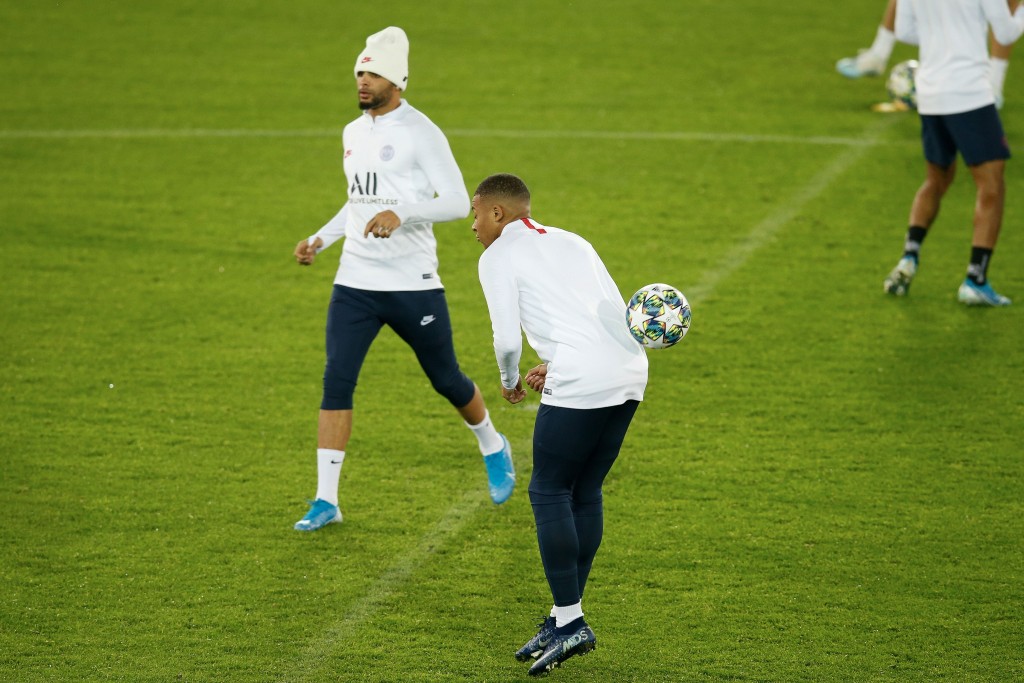 Is Kurzawa (L) set to make the switch to Arsenal this summer? (Photo by Bruno Fahy/BELGA/AFP via Getty Images)