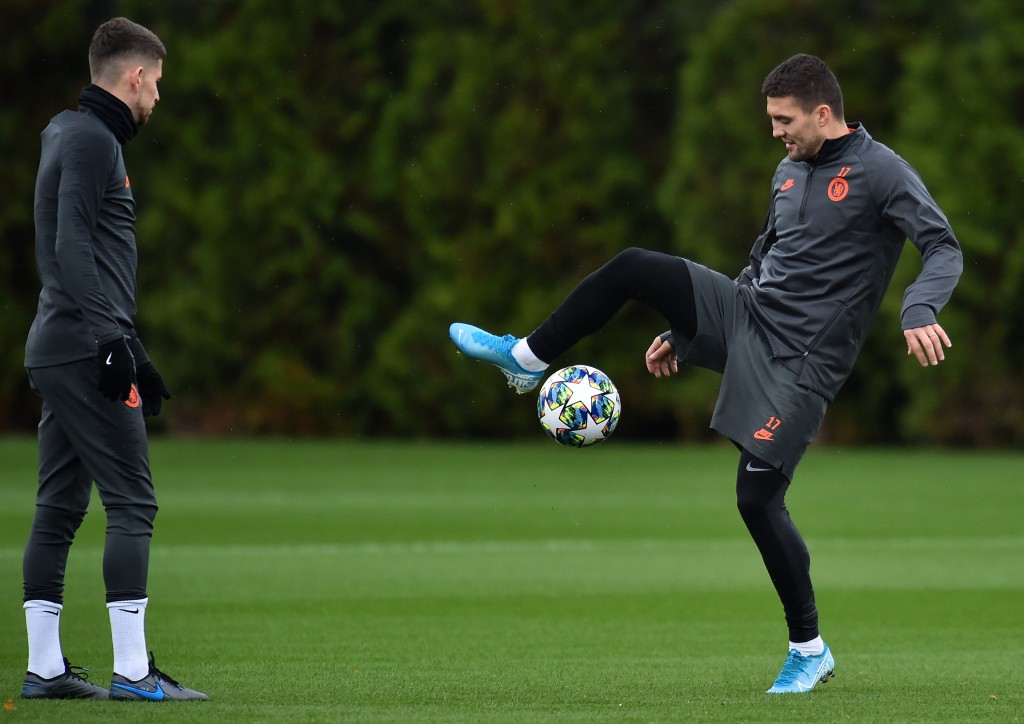 Chelsea's Italian midfielder Jorginho (L) and Chelsea's Croatian midfielder Mateo Kovacic attends a training session at Chelsea's Cobham training facility in Stoke D'Abernon, southwest of London on November 4, 2019, on the eve of their UEFA Champions League Group H football match against Ajax. (Photo by Glyn KIRK / AFP) (Photo by GLYN KIRK/AFP via Getty Images)