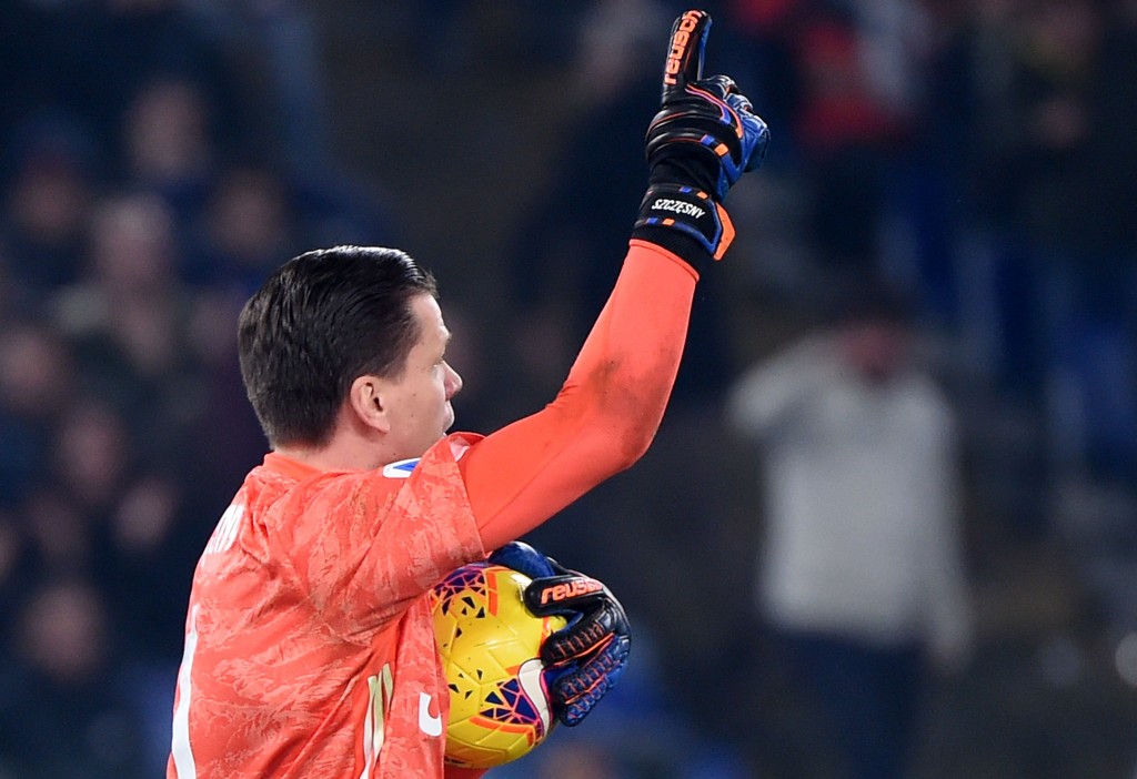Juventus' Polish goalkeeper Wojciech Szczesny reacts after saving a penalty during the Italian Serie A football match lazio Rome vs Juventus Turin on December 7, 2019 at the Olympic stadium in Rome. (Photo by Filippo MONTEFORTE / AFP) (Photo by FILIPPO MONTEFORTE/AFP via Getty Images)