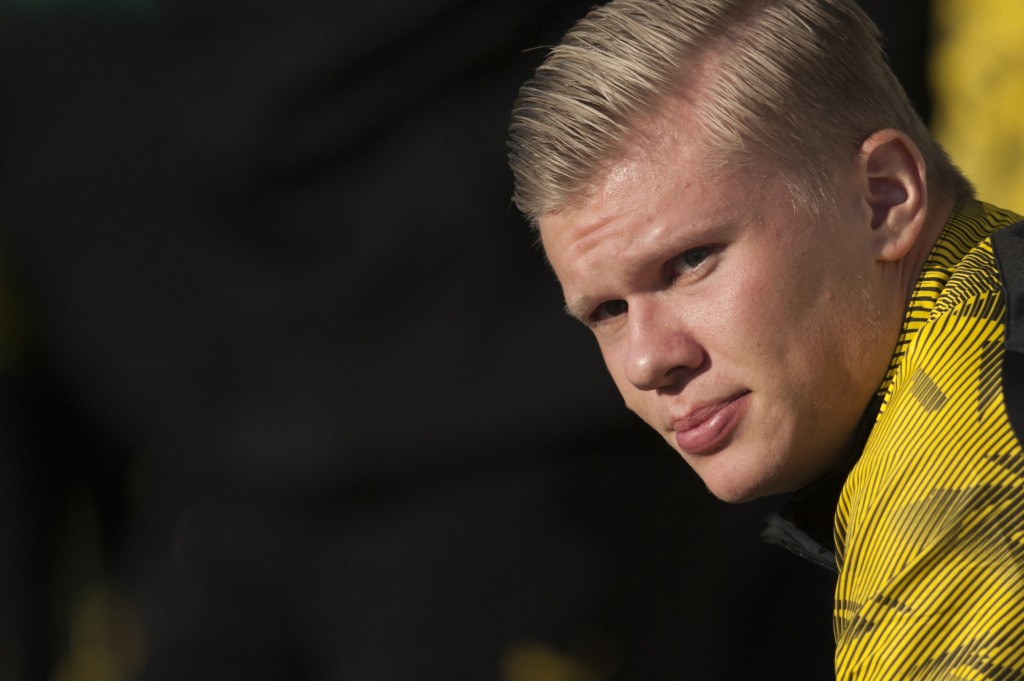 Borussia Dortmund's Norwegian forward Erling Braut Haland sits on the bench during the friendly football match between Standard Liege and Borussia Dortmund at the Antonio Lorenzo Cuevas municipal stadium in Marbella on January 7, 2020. (Photo by JORGE GUERRERO / AFP) / The erroneous mention[s] appearing in the metadata of this photo by JORGE GUERRERO has been modified in AFP systems in the following manner: [Norwegian] instead of [British]. Please immediately remove the erroneous mention[s] from all your online services and delete it (them) from your servers. If you have been authorized by AFP to distribute it (them) to third parties, please ensure that the same actions are carried out by them. Failure to promptly comply with these instructions will entail liability on your part for any continued or post notification usage. Therefore we thank you very much for all your attention and prompt action. We are sorry for the inconvenience this notification may cause and remain at your disposal for any further information you may require. (Photo by JORGE GUERRERO/AFP via Getty Images)