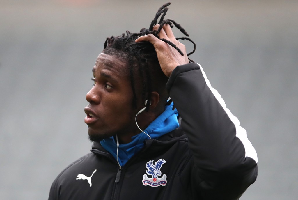 Wilfried Zaha is one of nine Crystal Palace players who will miss out against Manchester United. (Photo by Ian MacNicol/Getty Images)