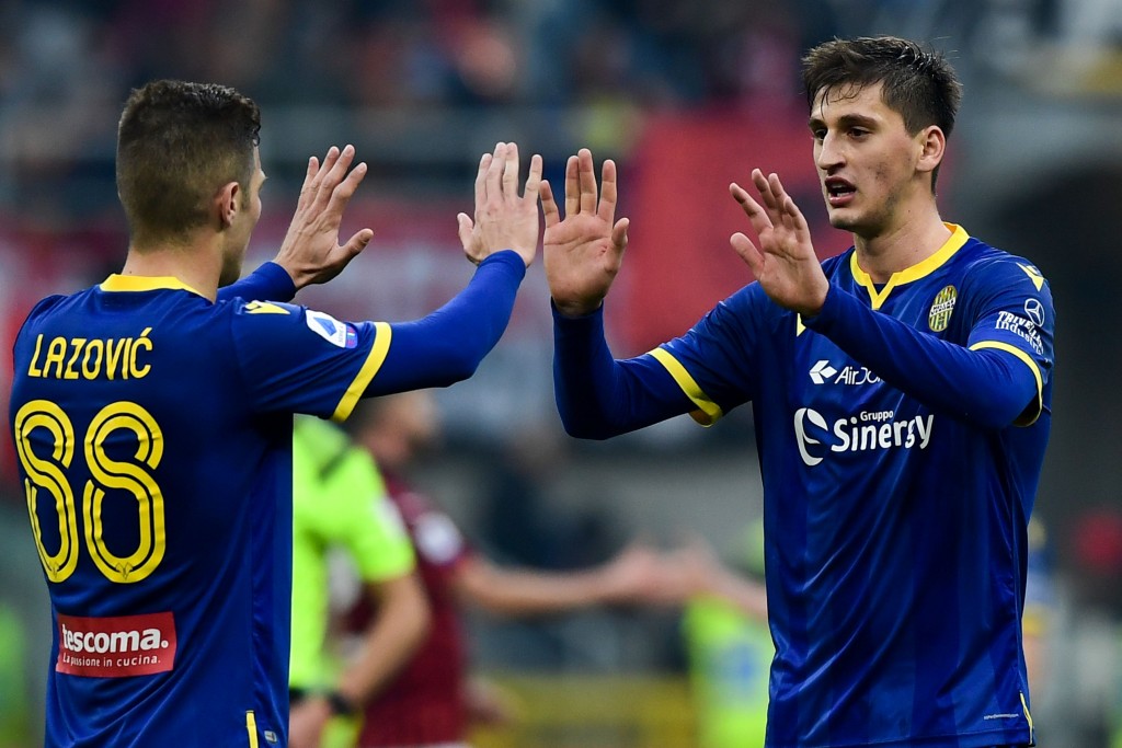 Verona's Serbian midfielder Darko Lazovic (L) and Verona's Albanian defender Marash Kumbulla react at the end of the Italian Serie A football match AC Milan vs Verona on February 2, 2020 at the San Siro stadium in Milan. (Photo by Miguel MEDINA / AFP) (Photo by MIGUEL MEDINA/AFP via Getty Images)